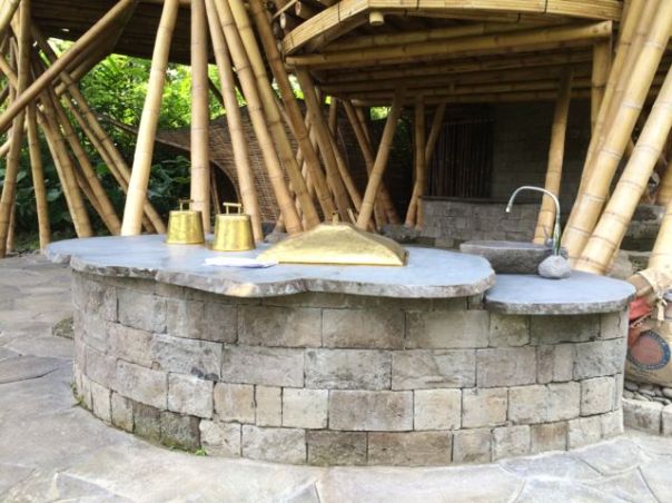 The bottom floor patio, outdoor kitchen and spa.