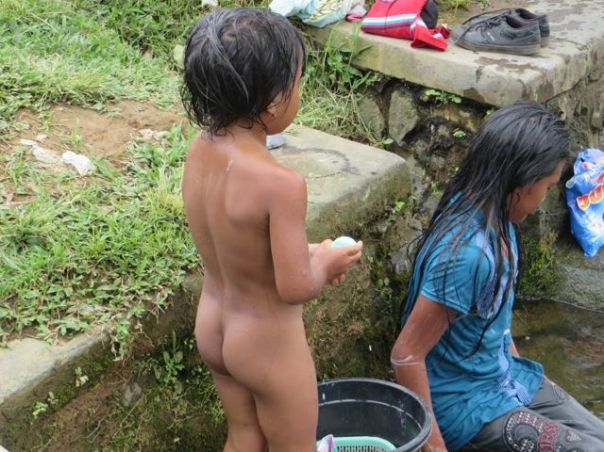 Bathing in the river.