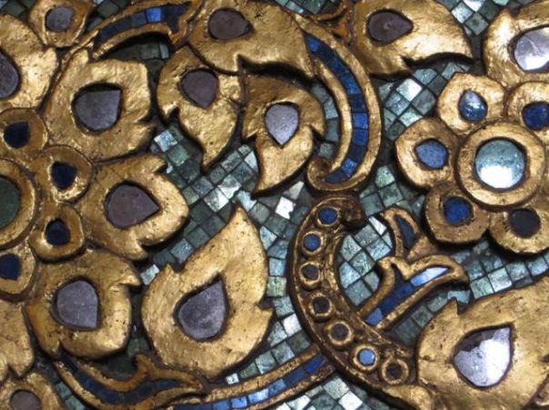 The glass mosaic detail that is on the base.