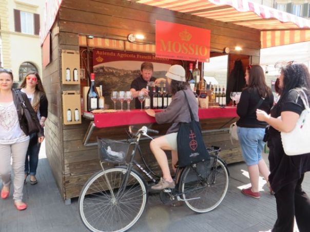 But this is one of my favorite pics...We were at an outdoor food market, and this girl just rode up on her bike and got a glass of wine...I LOVE ITALY!!!