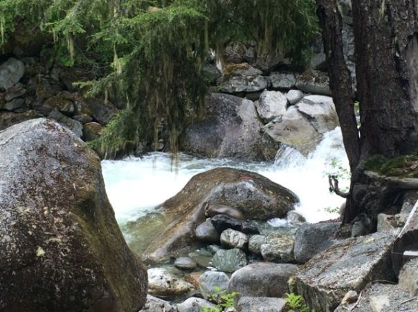 Glacial water rushing down from the top of Rainbow Trail
